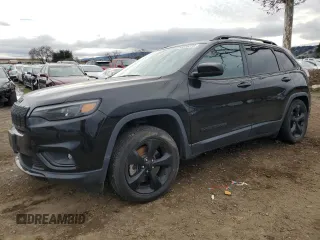 2020 Jeep Cherokee Altitude with VIN 1C4PJLLB2LD593027, listed as a Copart auction lot 86656274 with 76,376 mi miles and Salvage Title. Bid and sale history available at carsss.com. Image 1.