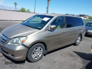 2007 Honda Odyssey EX z VIN 5FNRL38407B123509, wystawiony jako IAAI lot #42238353 z przebiegiem 200 111 mil mil oraz . Historia ofert i sprzedaży dostępna na DreamBid. Obrazek 12.