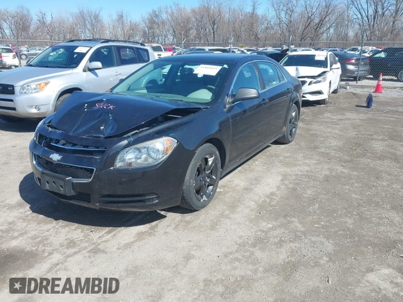 2012 Chevrolet Malibu 1LS with VIN 1G1ZB5E04CF180746, listed as a IAAI auction lot 41866051 with 140,002 mi miles and . Bid and sale history available at DreamBid. Image 2.