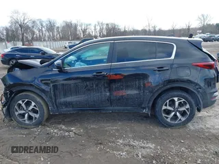 2021 Kia Sportage LX with VIN KNDPM3AC6M7845686, listed as a IAAI auction lot 41444426 with 28,764 mi miles. Bid and sale history available at carsss.com. Image 14.