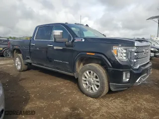 2023 GMC Sierra 2500HD Denali with VIN 1GT49REY5PF261321, listed as a Copart auction lot 46330735 with 47,782 mi miles and Salvage Title. Bid and sale history available at carsss.com. Image 4.