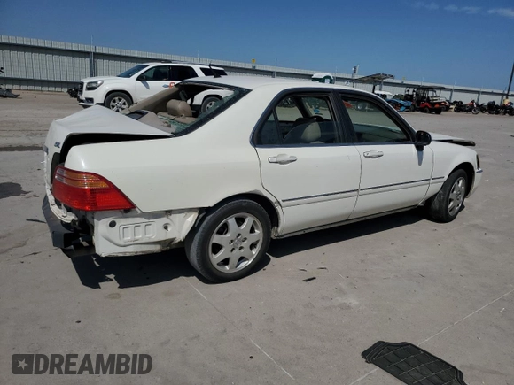 2002 Acura RL z VIN JH4KA96582C001815, wystawiony jako Copart lot #56925125 z przebiegiem Nie podano mil oraz Szkoda całkowita • Salvage title. Historia ofert i sprzedaży dostępna na DreamBid. Obrazek 3.