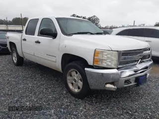 2013 Chevrolet Silverado 1500 LT with VIN 3GCPKSE71DG376346, listed as a IAAI auction lot 41046128 with 190,709 mi miles. Bid and sale history available at carsss.com. Image 1.