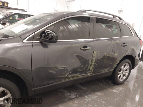 2015 Mazda CX-9 Sport with VIN JM3TB2BA1F0453620, listed as a IAAI auction lot 41330887 with 119,219 mi miles and . Bid and sale history available at carsss.com. Image 6.