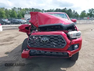 2021 Toyota Tacoma SR z VIN 5TFCZ5AN2MX263159, wystawiony jako IAAI lot #42273087 z przebiegiem 69 220 mil mil oraz . Historia ofert i sprzedaży dostępna na DreamBid. Obrazek 11.