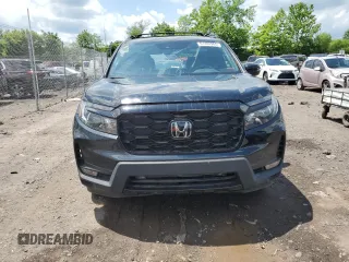 2023 Honda Passport Elite with VIN 5FNYF8H01PB030270, listed as a Copart auction lot 61402965 with 7,931 mi miles and Salvage title. Bid and sale history available at DreamBid. Image 5.