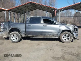 2019 Ram 1500 Big Horn z VIN 1C6RRFFG7KN755373, wystawiony jako IAAI lot #41764161 z przebiegiem 116 804 mil mil oraz . Historia ofert i sprzedaży dostępna na DreamBid. Obrazek 13.