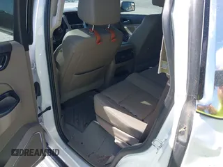 2019 GMC Yukon SLT with VIN 1GKS1BKC9KR332014, listed as a IAAI auction lot 40674460 with 76,545 mi miles. Bid and sale history available at carsss.com. Image 8.