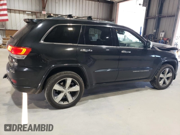 2015 Jeep Grand Cherokee Overland with VIN 1C4RJFCG0FC783375, listed as a Copart auction lot 61966725 with 191,478 mi miles and Salvage title. Bid and sale history available at DreamBid. Image 3.