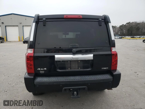 2007 Jeep Commander Overland with VIN 1J8HG68247C557731, listed as a Copart auction lot 87964795 with 174,195 mi miles and Salvage title. Bid and sale history available at DreamBid. Image 6.