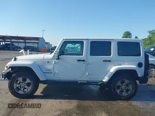2016 Jeep Wrangler Unlimited 75th Anniversary z VIN 1C4BJWEG1GL250449, wystawiony jako IAAI lot #42204012 z przebiegiem 180 173 mil mil oraz . Historia ofert i sprzedaży dostępna na DreamBid. Obrazek 14.