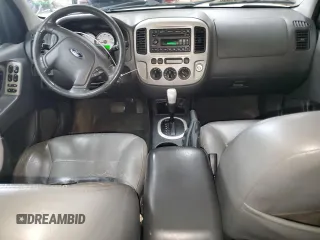 2006 Ford Escape XLT with VIN 1FMCU03106KC14923, listed as a Copart auction lot 52727095 with 126,842 mi miles and Salvage Title. Bid and sale history available at DreamBid. Image 8.