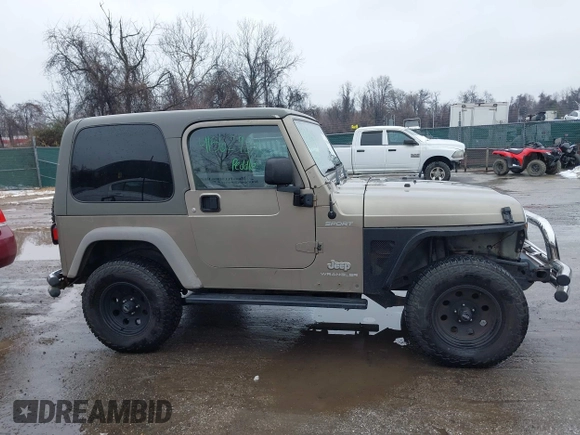 2006 Jeep Wrangler Sport Right Hand Drive with VIN 1J4F449S06P725862, listed as a IAAI auction lot 41562989 with 121,997 mi miles. Bid and sale history available at carsss.com. Image 13.