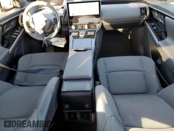 2023 Toyota bZ4X XLE with VIN JTMAAAAA8PA015784, listed as a Copart auction lot 56072755 with 21,387 mi miles and Salvage Title. Bid and sale history available at DreamBid. Image 8.