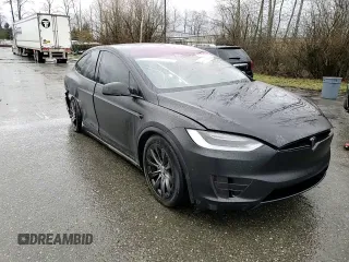 2017 Tesla Model X 90D z VIN 5YJXCBE2XHF078598, wystawiony jako Copart lot #46751395 z przebiegiem 58 115 mil mil oraz Szkody całkowita. Historia ofert i sprzedaży dostępna na DreamBid. Obrazek 12.