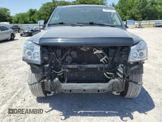 2015 Nissan Titan Pro-4X with VIN 1N6BA0EC5FN514184, listed as a Copart auction lot 56721065 with 127,283 mi miles and Salvage title. Bid and sale history available at DreamBid. Image 5.
