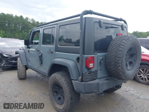 2015 Jeep Wrangler Unlimited Sport with VIN 1C4HJWDG1FL635620, listed as a IAAI auction lot 42396137 with 87,352 mi miles and . Bid and sale history available at DreamBid. Image 14.