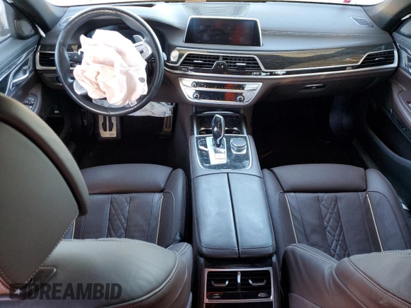2022 BMW 7 Series 750i xDrive z VIN WBA7U2C01NCK62283, wystawiony jako Copart lot #83007534 z przebiegiem Nie podano mil oraz Szkoda całkowita • Salvage title. Historia ofert i sprzedaży dostępna na DreamBid. Obrazek 8.