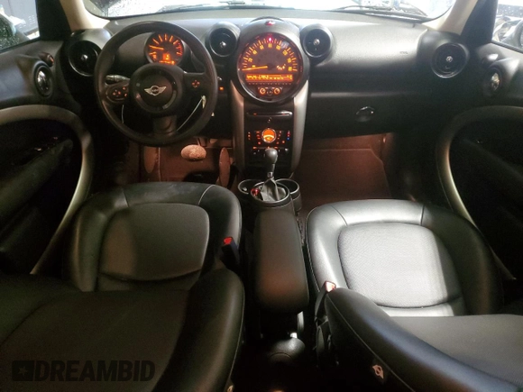 2015 MINI Countryman with VIN WMWZB3C53FWR43903, listed as a Copart auction lot 86384294 with 112,667 mi miles and Salvage Title. Bid and sale history available at DreamBid. Image 8.