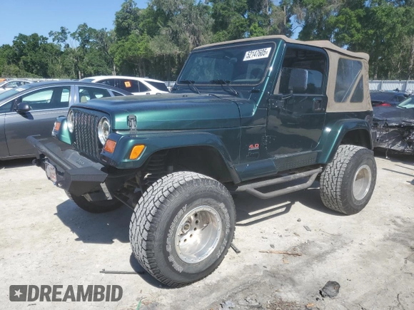 1999 Jeep Wrangler Sahara with VIN 1J4FY49S6XP478675, listed as a Copart auction lot 52147605 with 157,971 mi miles and Salvage Title. Bid and sale history available at carsss.com. Image 1.