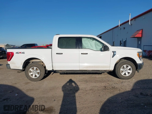2021 Ford F-150 XL with VIN 1FTEW1EP5MKE25613, listed as a IAAI auction lot 42028237 with 116,341 mi miles. Bid and sale history available at carsss.com. Image 13.