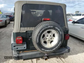 2003 Jeep Wrangler Sport with VIN 1J4FA49S43P301542, listed as a Copart auction lot 75704824 with Not Provided miles and Salvage Title. Bid and sale history available at carsss.com. Image 6.