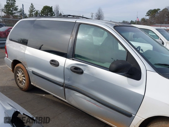 2002 Ford Windstar LX z VIN 2FMZA51482BA86819, wystawiony jako IAAI lot #41395576 z przebiegiem 115 762 mil mil oraz . Historia ofert i sprzedaży dostępna na DreamBid. Obrazek 13.
