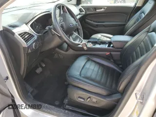 2019 Ford Edge SEL with VIN 2FMPK4J90KBB40298, listed as a Copart auction lot 56953585 with 110,639 mi miles and Salvage title. Bid and sale history available at DreamBid. Image 7.