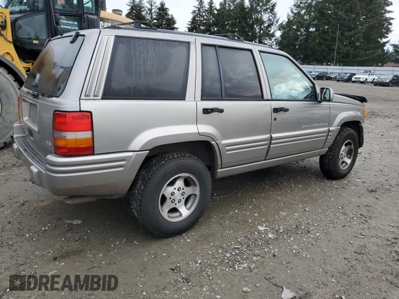 1997 Jeep Grand Cherokee Limited with VIN 1J4GZ78Y4VC693193, listed as a Copart auction lot 46327885 with 235,553 mi miles and Salvage Title. Bid and sale history available at carsss.com. Image 3.