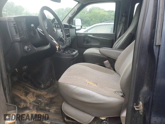 2013 Chevrolet Express Cargo with VIN 1GCWGFCA3D1125104, listed as a Copart auction lot 56348725 with Not provided miles and Salvage title. Bid and sale history available at DreamBid. Image 7.