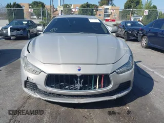 2014 Maserati Ghibli S Q4 z VIN ZAM57RTA8E1095303, wystawiony jako IAAI lot #41600587 z przebiegiem 98 215 mil mil oraz . Historia ofert i sprzedaży dostępna na DreamBid. Obrazek 12.