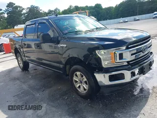 2019 Ford F-150 XL with VIN 1FTEW1E56KFA63764, listed as a IAAI auction lot 42410872 with 124,648 mi miles and . Bid and sale history available at DreamBid. Image 1.