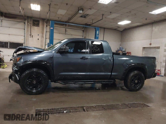 2009 Toyota Tundra 4WD Truck with VIN 5TFBW54199X091510, listed as a IAAI auction lot 42025369 with 234,784 mi miles. Bid and sale history available at carsss.com. Image 14.