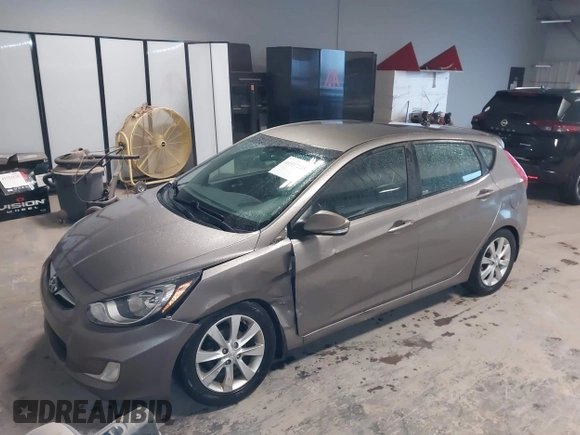 2013 Hyundai Accent SE with VIN KMHCU5AE6DU097353, listed as a IAAI auction lot 41937225 with 173,447 mi miles. Bid and sale history available at carsss.com. Image 17.