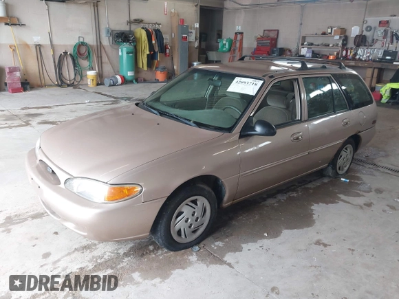 1998 Ford Escort SE with VIN 3FAFP15P6WR239732, listed as a IAAI auction lot 42093718 with 116,930 mi miles. Bid and sale history available at carsss.com. Image 2.
