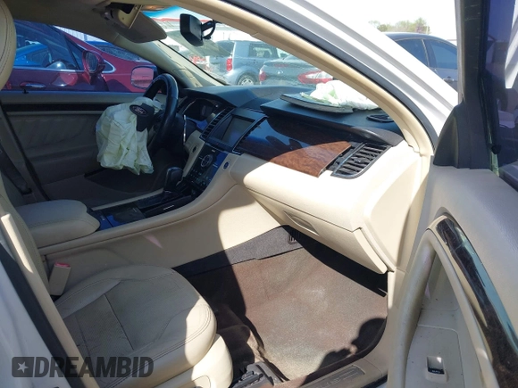 2013 Ford Taurus Limited with VIN 1FAHP2F82DG218533, listed as a IAAI auction lot 41934075 with 172,173 mi miles and . Bid and sale history available at DreamBid. Image 5.