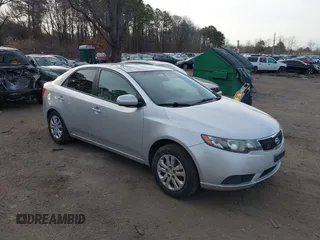 2011 Kia Forte LX with VIN KNAFT4A24B5403622, listed as a IAAI auction lot 41774093 with 143,971 mi miles. Bid and sale history available at carsss.com. Image 1.