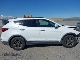 2017 Hyundai Santa Fe 2.4L z VIN 5NMZU3LB1HH045714, wystawiony jako IAAI lot #41949139 z przebiegiem 151 799 mil mil oraz . Historia ofert i sprzedaży dostępna na DreamBid. Obrazek 13.