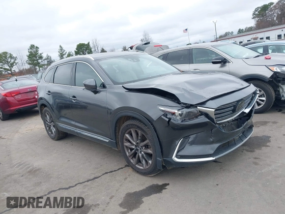 2016 Mazda CX-9 Grand Touring with VIN JM3TCADY4G0111310, listed as a IAAI auction lot 41532851 with 178,907 mi miles and . Bid and sale history available at DreamBid. Image 1.