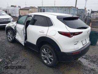 2021 Mazda CX-30 Select with VIN 3MVDMBBL3MM205256, listed as a IAAI auction lot 41302313 with 17,709 mi miles and . Bid and sale history available at DreamBid. Image 3.