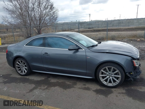 2016 Audi A5 Premium Plus with VIN WAUM2AFR1GA053119, listed as a IAAI auction lot 41724238 with 128,639 mi miles. Bid and sale history available at carsss.com. Image 13.