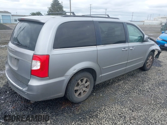 2013 Chrysler Town & Country Touring with VIN 2C4RC1BG2DR656629, listed as a IAAI auction lot 42024459 with 209,472 mi miles and . Bid and sale history available at DreamBid. Image 4.