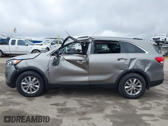 2016 Kia Sorento LX with VIN 5XYPG4A35GG149678, listed as a IAAI auction lot 41478731 with 128,895 mi miles. Bid and sale history available at carsss.com. Image 14.