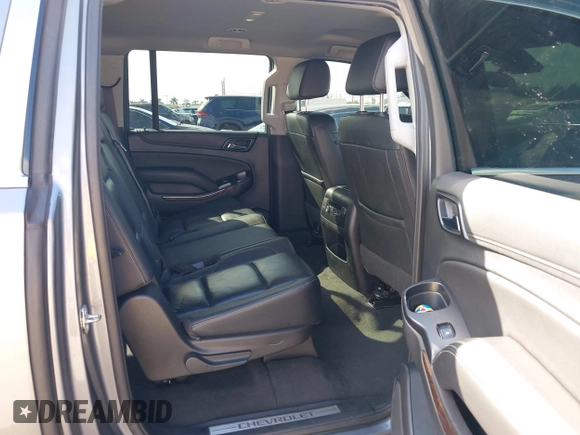 2020 Chevrolet Suburban LT z VIN 1GNSCHKC8LR157188, wystawiony jako IAAI lot #41578614 z przebiegiem 82 566 mil mil oraz . Historia ofert i sprzedaży dostępna na DreamBid. Obrazek 8.