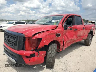 2024 Nissan Titan XD PRO-4X with VIN 1N6AA1FB9RN110722, listed as a Copart auction lot 64190064 with 4,732 mi miles and Salvage Title. Bid and sale history available at carsss.com. Image 1.