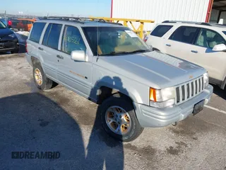 1997 Jeep Grand Cherokee Limited with VIN 1J4GZ78Y8VC718435, listed as a IAAI auction lot 41405361 with 210,599 mi miles. Bid and sale history available at carsss.com. Image 1.