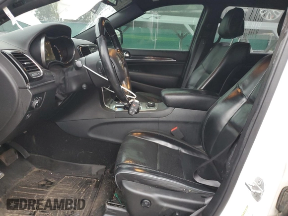 2019 Jeep Grand Cherokee Overland with VIN 1C4RJFCT7KC640527, listed as a Copart auction lot 54276725 with 282,202 mi miles and Salvage title. Bid and sale history available at DreamBid. Image 7.