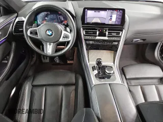 2025 BMW 8 Series 840i with VIN WBAAE4C07SCS11297, listed as a Copart auction lot 52829295 with 22,473 mi miles and Clean Title. Bid and sale history available at carsss.com. Image 8.