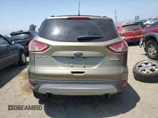 2013 Ford Escape SE with VIN 1FMCU0GX4DUB91663, listed as a Copart auction lot 59167195 with 115,081 mi miles and Salvage title. Bid and sale history available at DreamBid. Image 6.