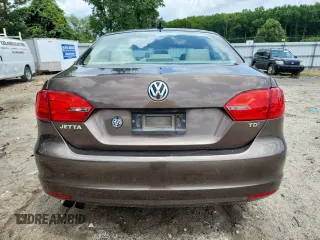 2014 Volkswagen Jetta TDI w/Premium with VIN 3VW3L7AJ9EM303218, listed as a Copart auction lot 64261985 with 187,371 mi miles and Clean title. Bid and sale history available at DreamBid. Image 6.